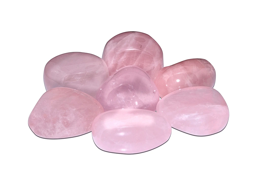 Few pieces of polished rose quartz