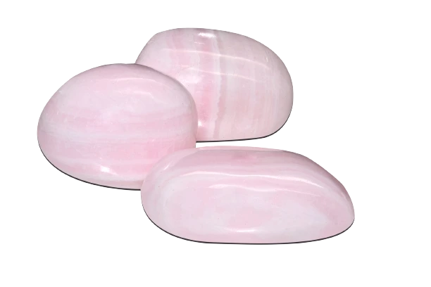 3 pieces of polished mangano calcite on a white background
