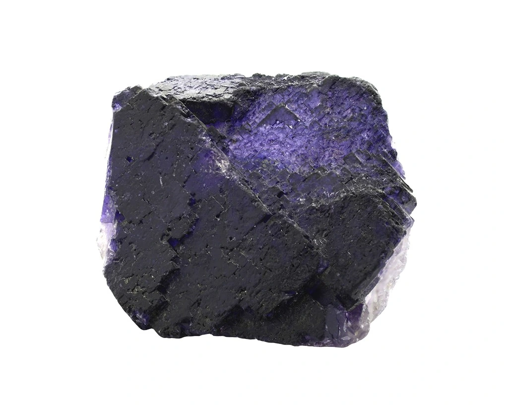 A fluorite crystal on a white background