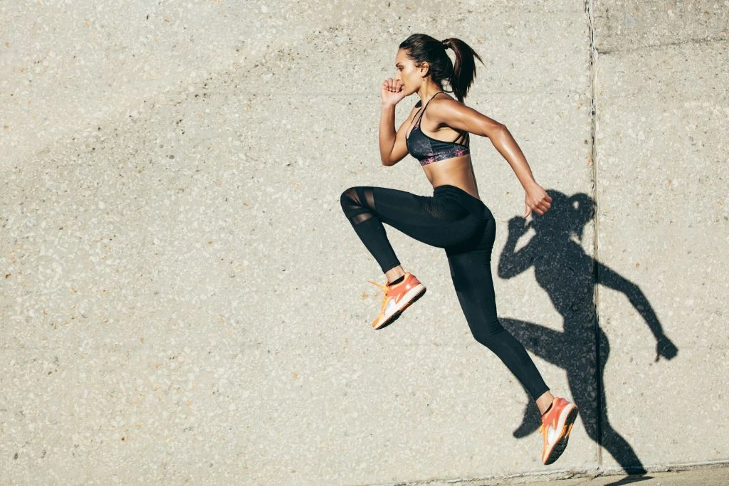 A woman jogging in the outdoors