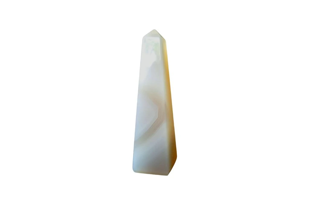 Obelisk Shape Chalcedony Crystal on a white background