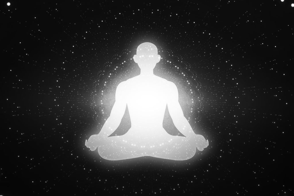 White aura on a black space background