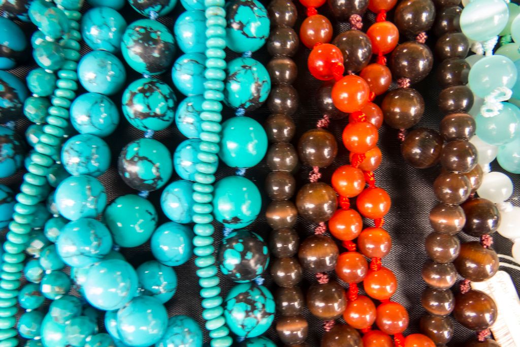 close up photo of turquoise beads