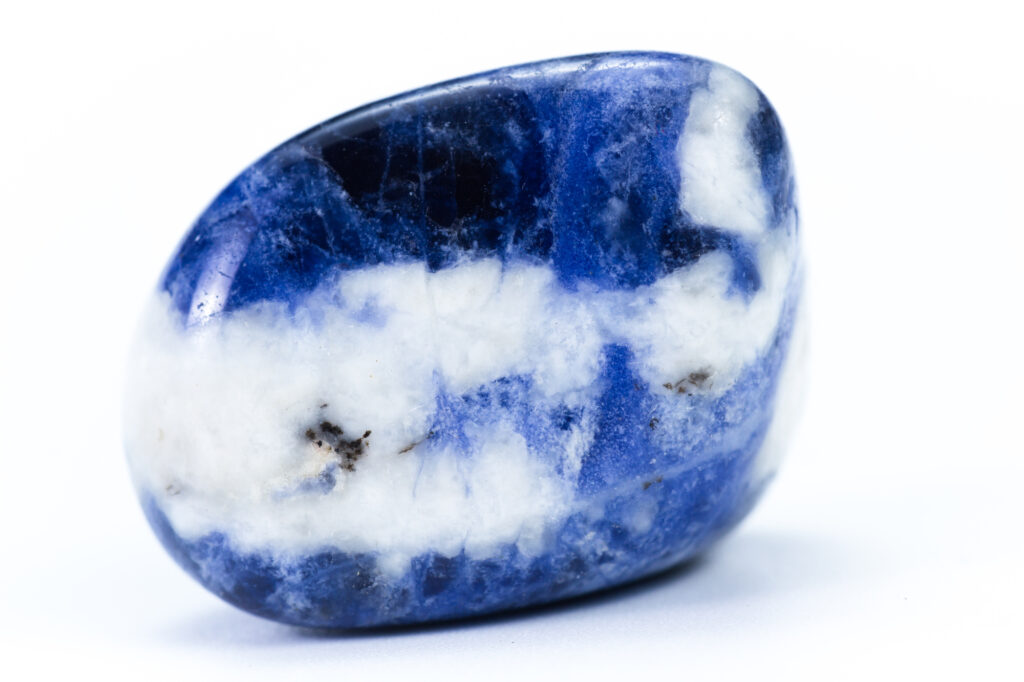 polished piece of sodalite isolated on a white background