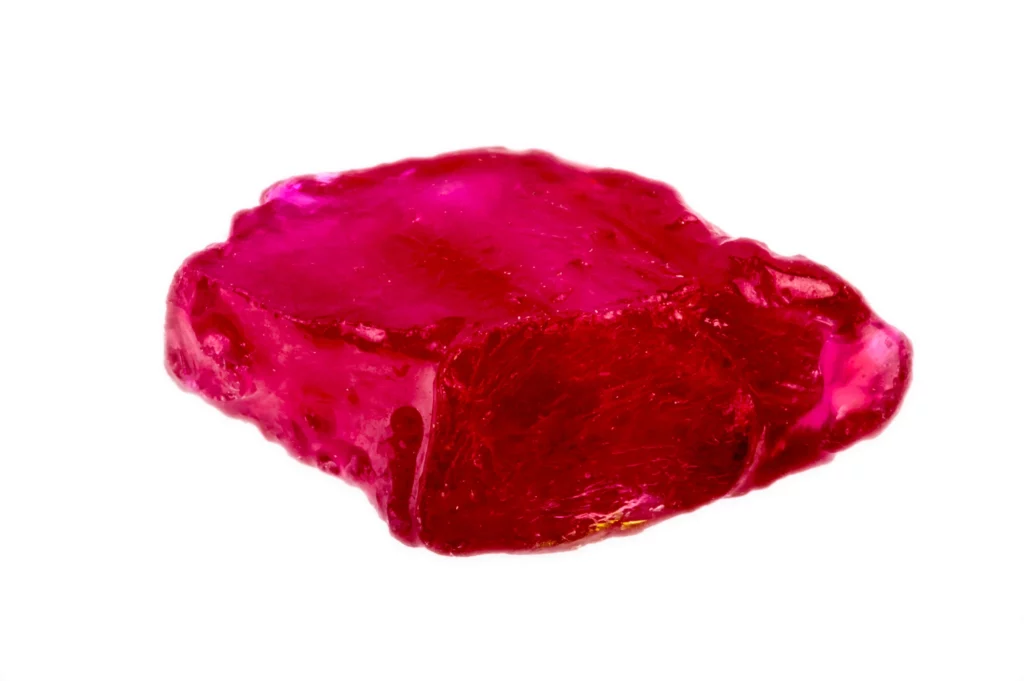 Uncut Ruby in a white background