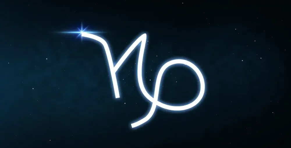 Capricorn zodiac sign on a deep blue space background