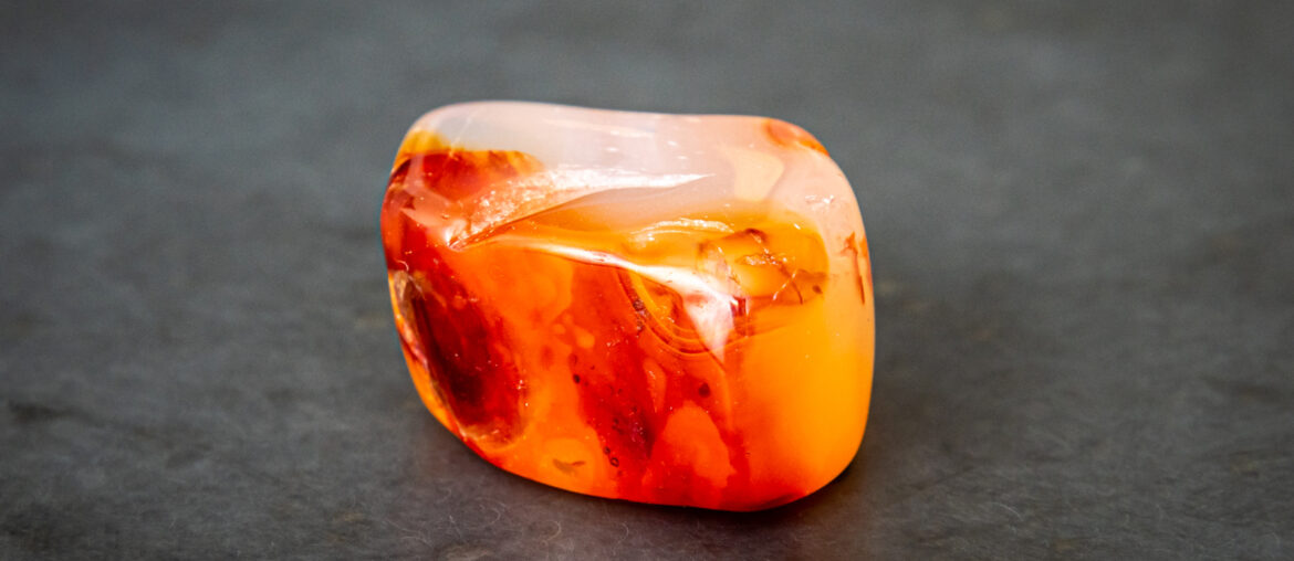carnelian on a smooth gray table surface