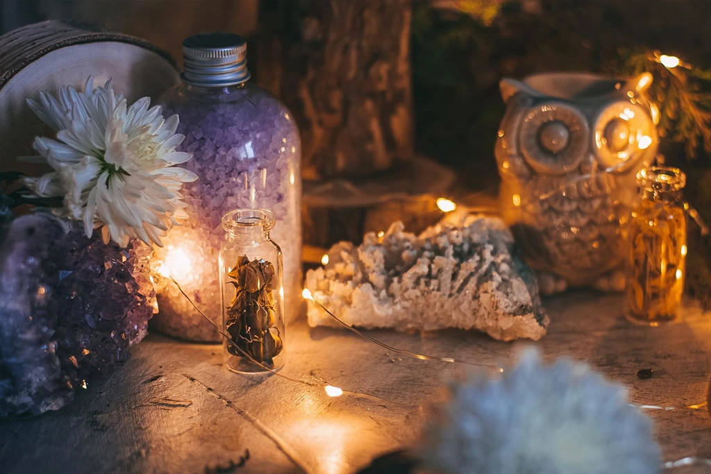 Manifestation ritual using candles and herbs