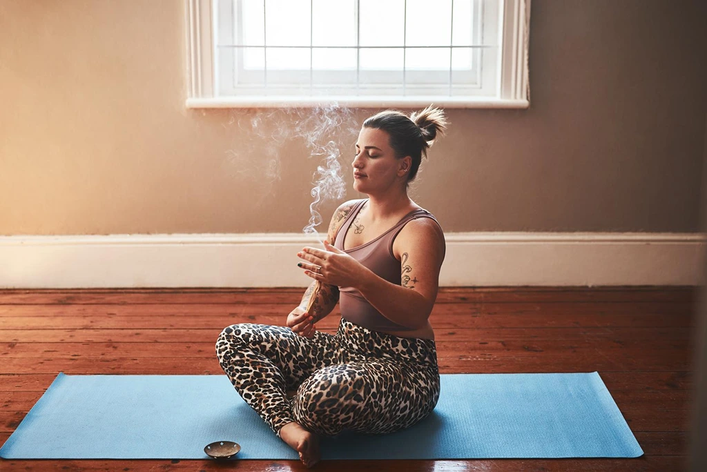 Woman preparing for smudging