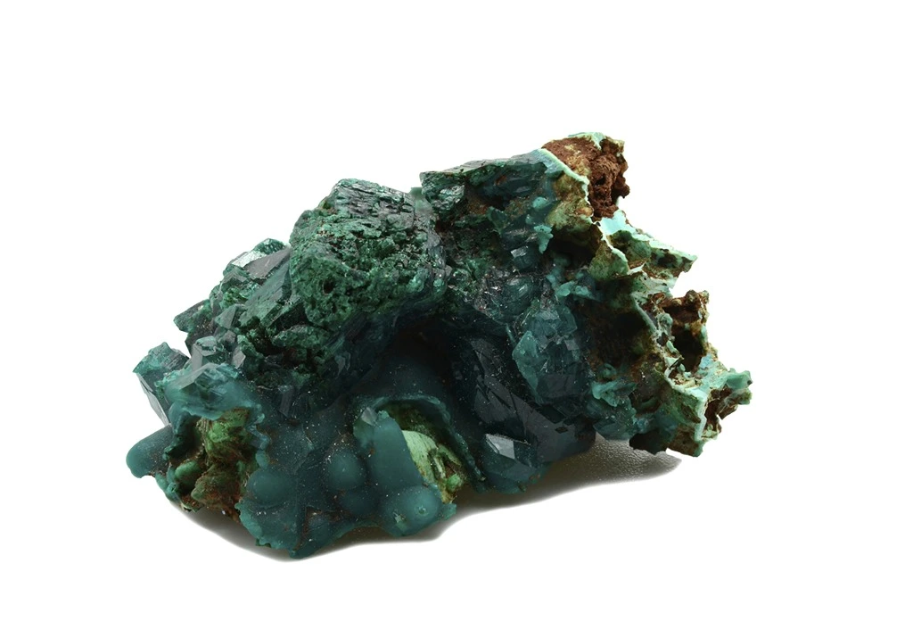 Clusters of Dioptase in a white background