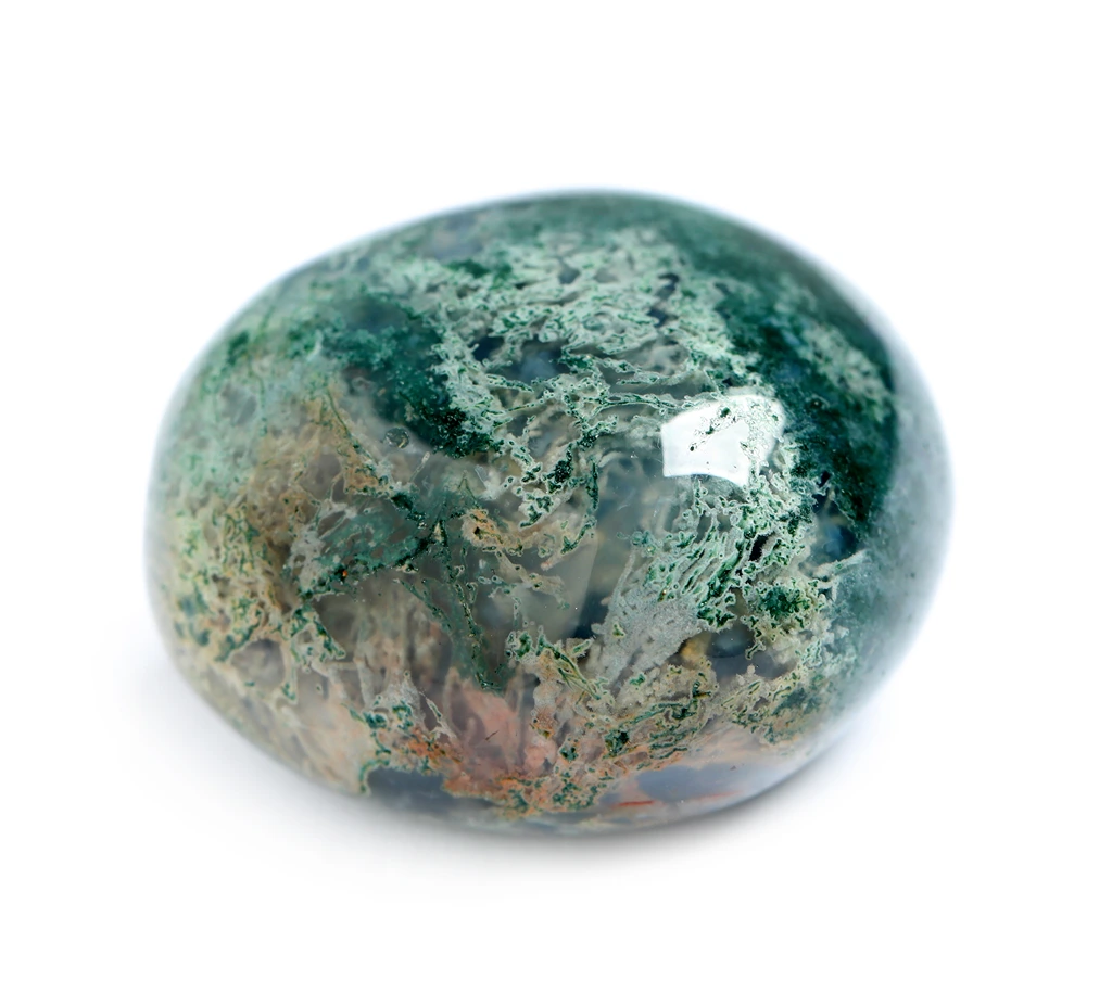 polished moss agate on a white background