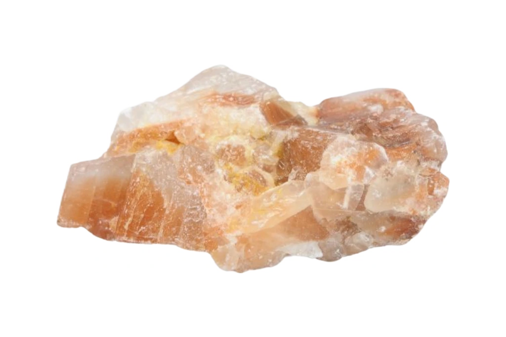 raw orange calcite on a white background