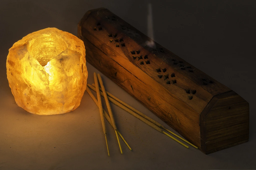 selenite lamp together with incense stick