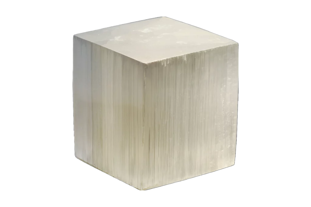 Selenite cube on a white background