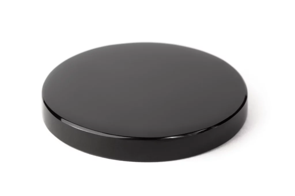 Black obsidian mirror on a white background