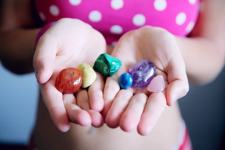 polished stones on model's hand