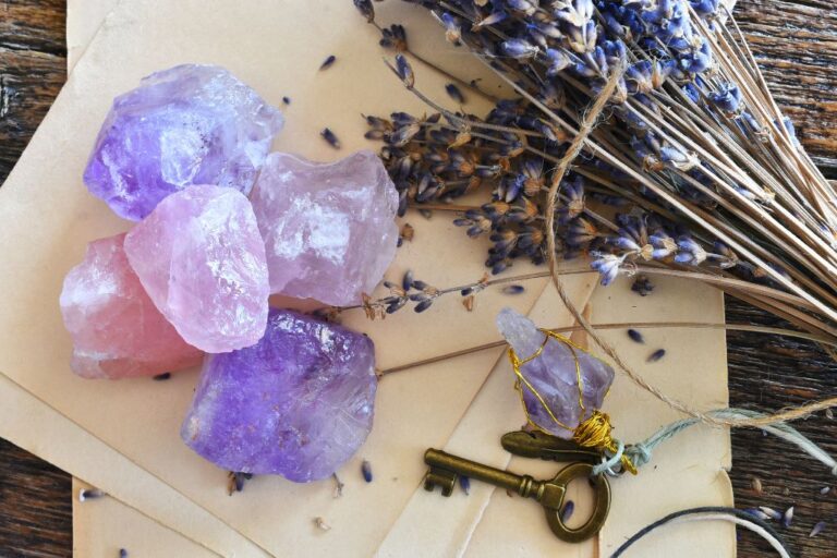 Amethyst Crystals with dried flowers and old keys on a brown paper