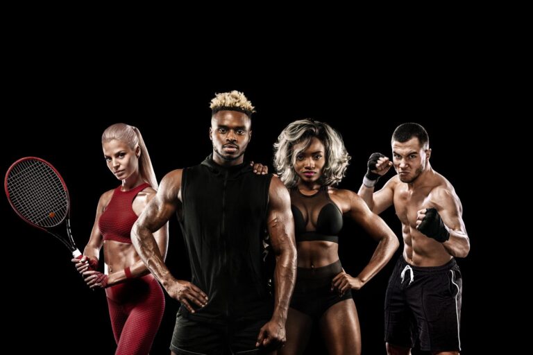 athletes posing on a black background