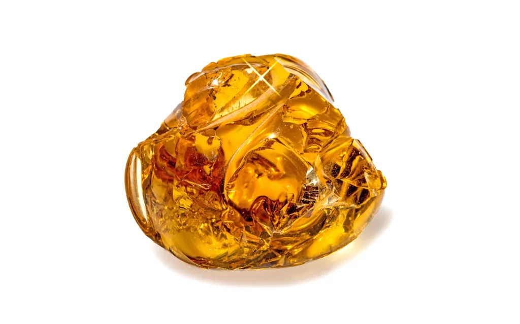 Amber crystal on a white background