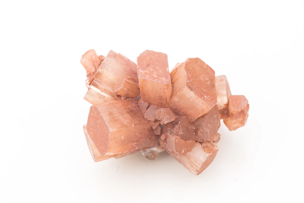 a chunk of aragonite on a white background