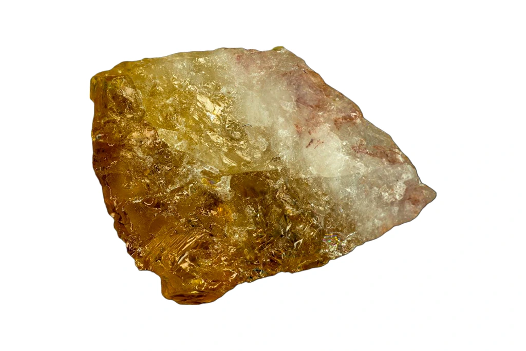 Citrine quartz chunk on a white background