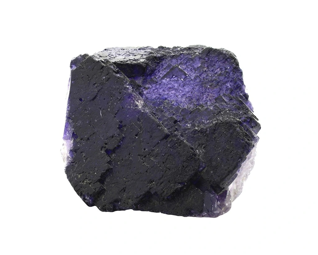 purple fluorite chunk on a white background