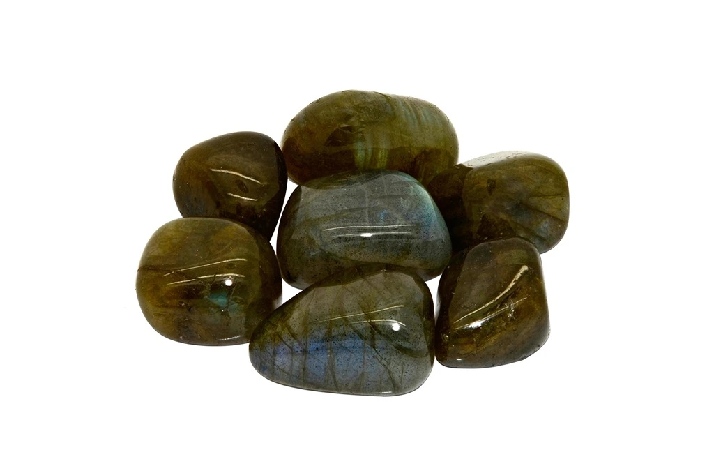 polished labradorite stones on a white background