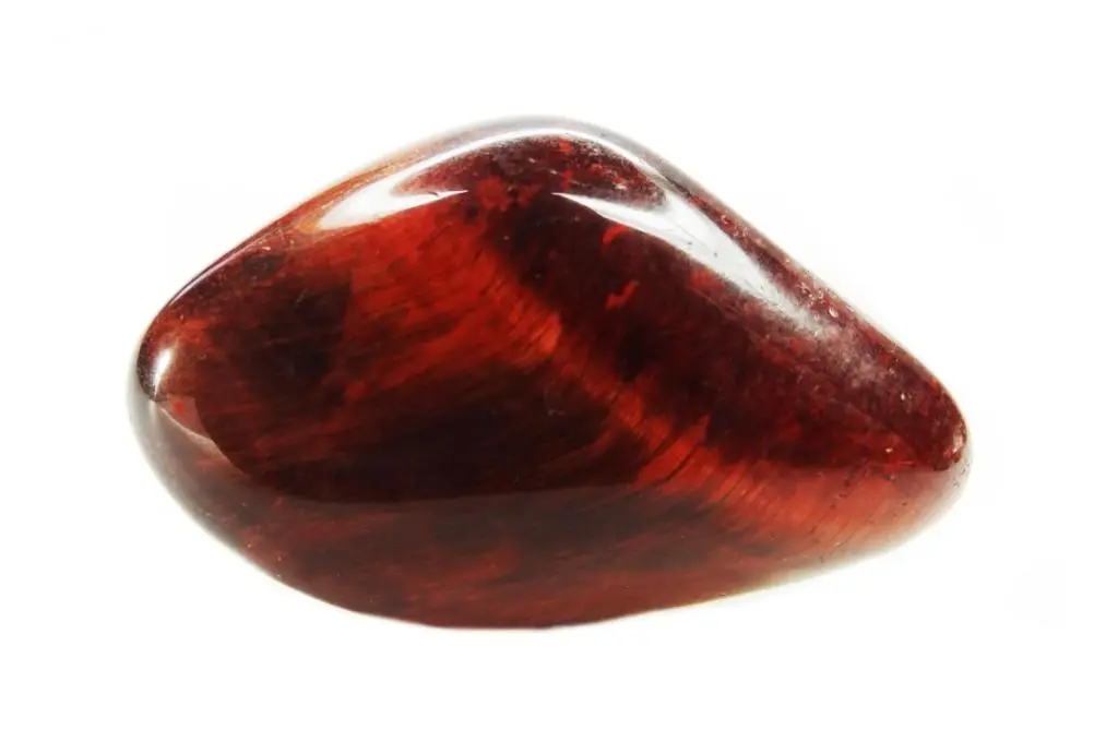 Red Tiger Eye Crystal on a white background