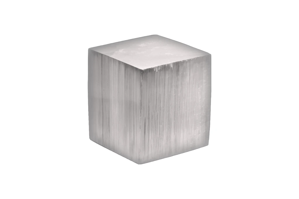 selenite cube on a white background