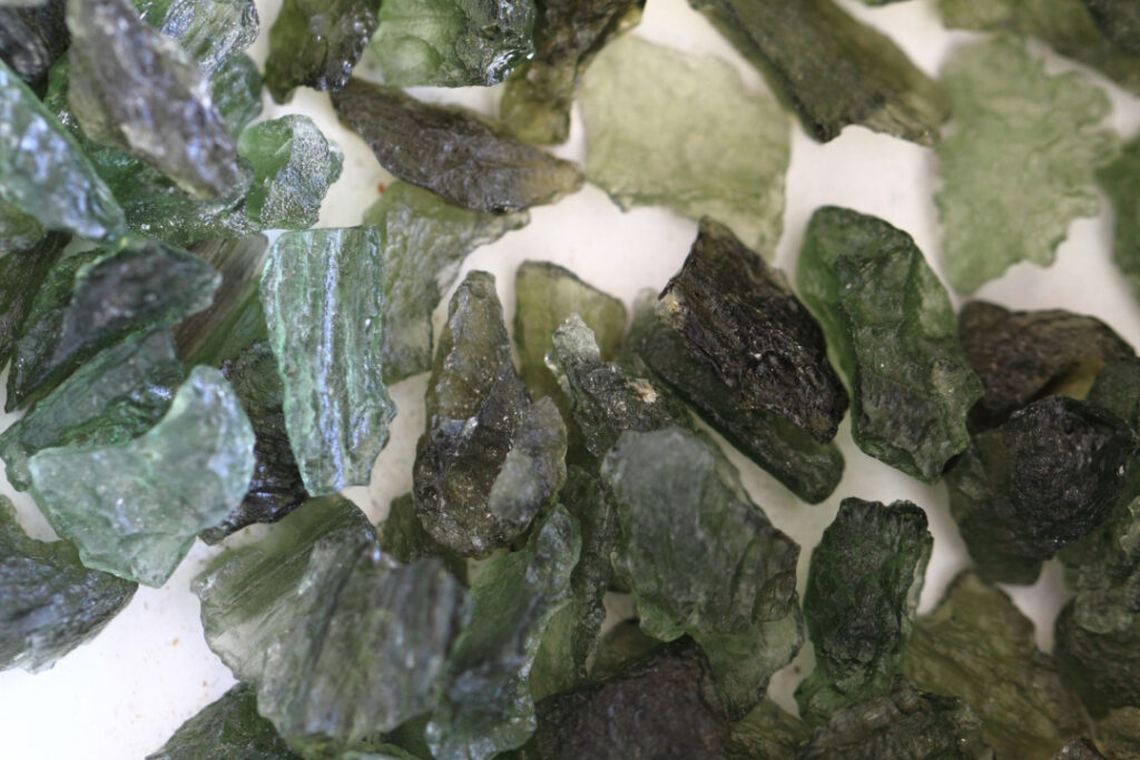 pieces of moldavite on top of each other
