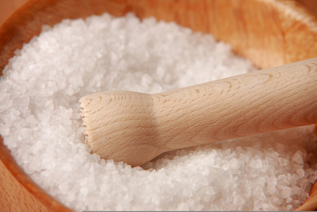 salt on a wooden bowl