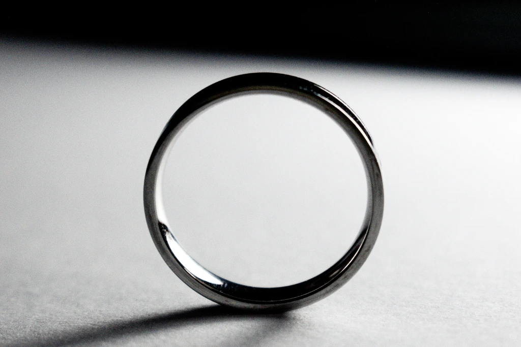 black ring on a gray background with shadows