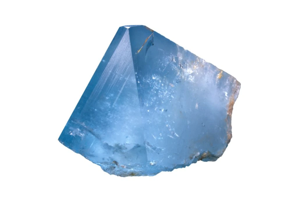 chunk of blue topaz crystal on a white bakground
