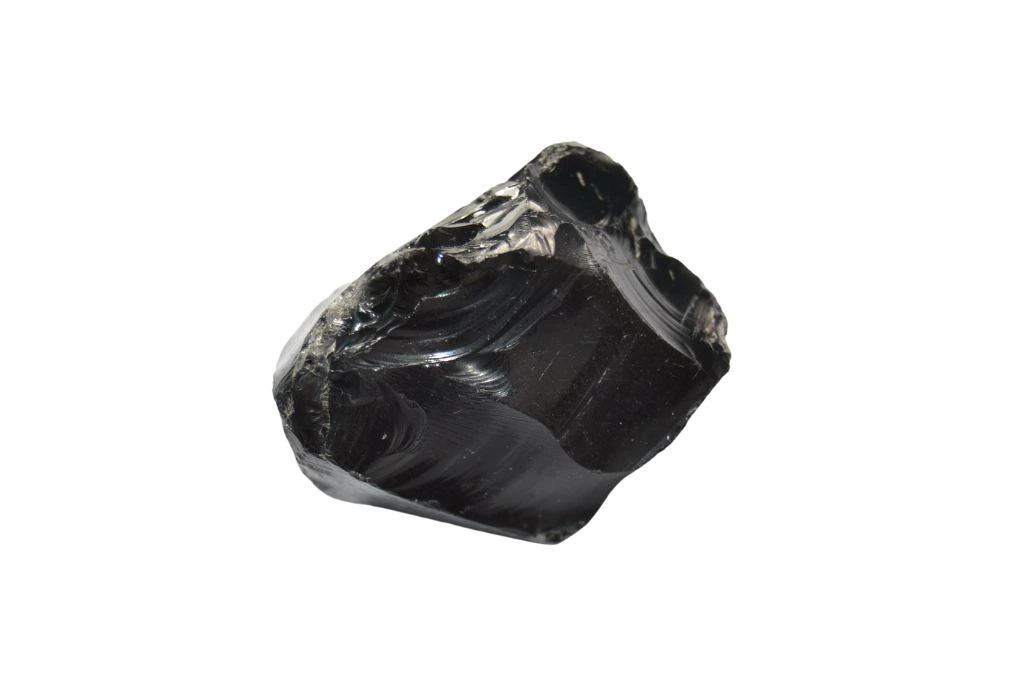 raw obsidian on white background