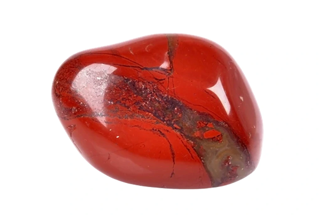a piece of red jasper on a white background