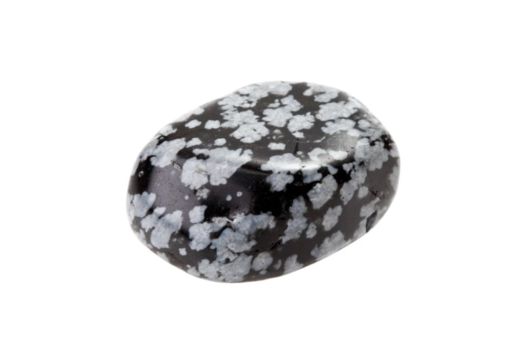 polished snowflake obsidian on a white background