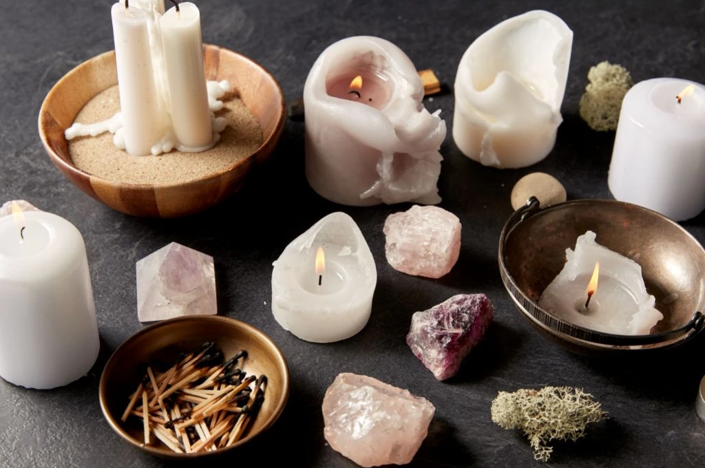 crystals together with lit candles