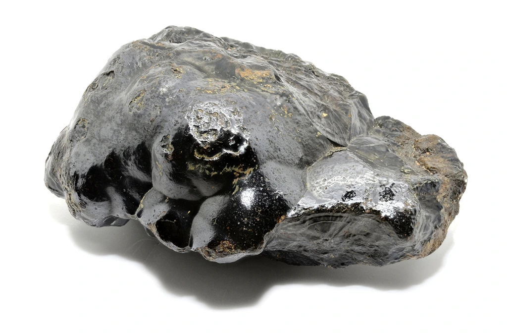 a chunk of hematite for better sleep on a white background
