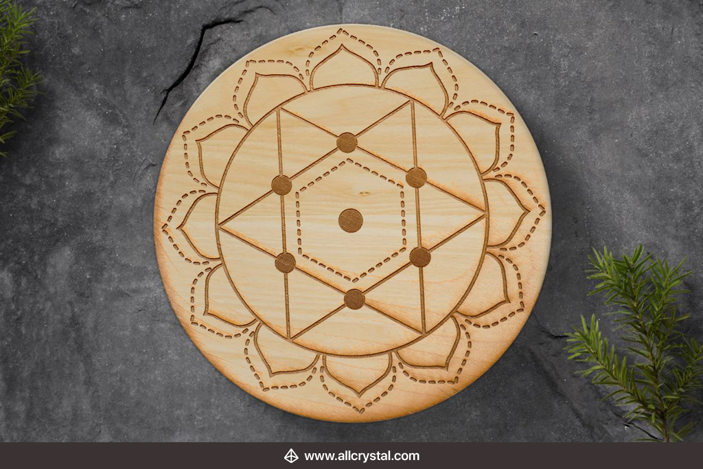 heart chakra crystal grid board on a marble like platform 