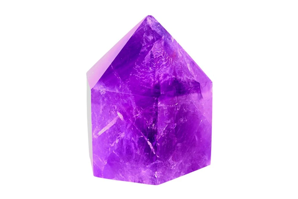 Amethyst crystal on a white background