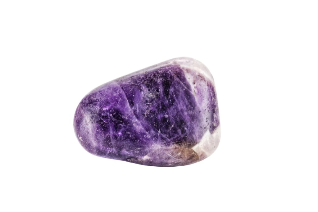 polished amethyst on white background