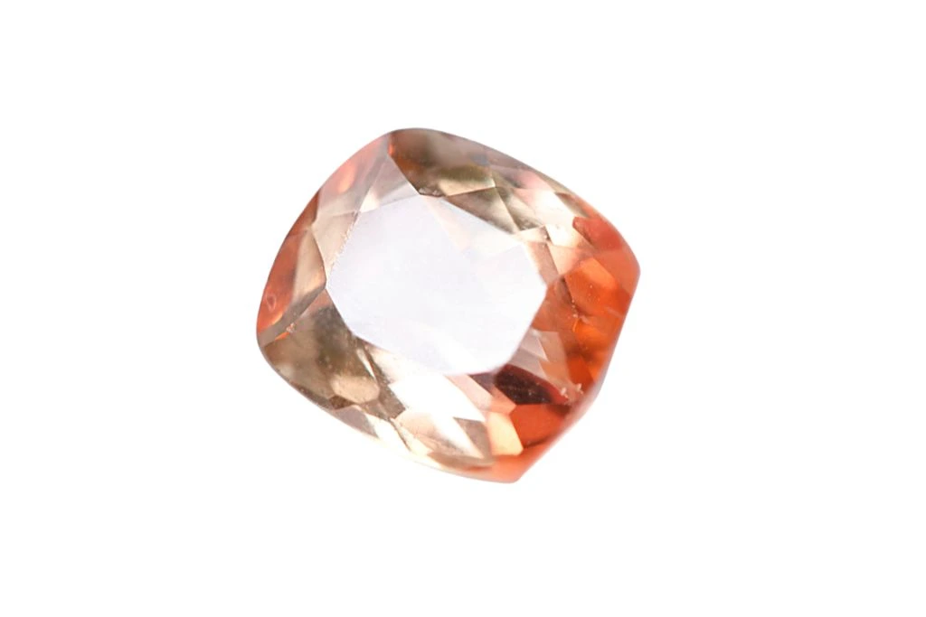 diamond cut andalusite on a white background