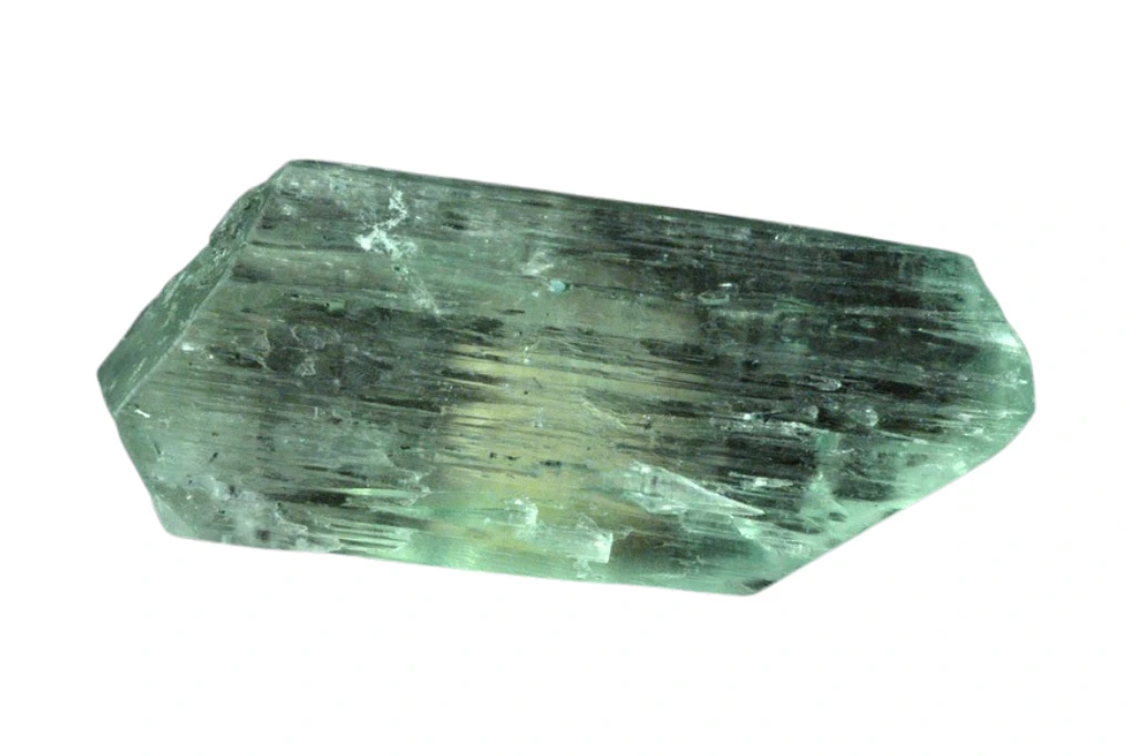 green kunzite chunk on a white background