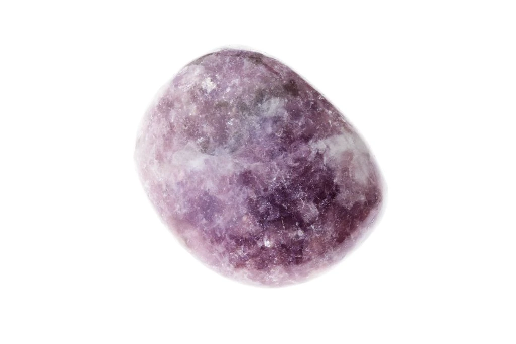 polished Lepidolite on white background