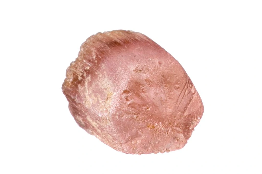 raw Poudretteite crystal on white background