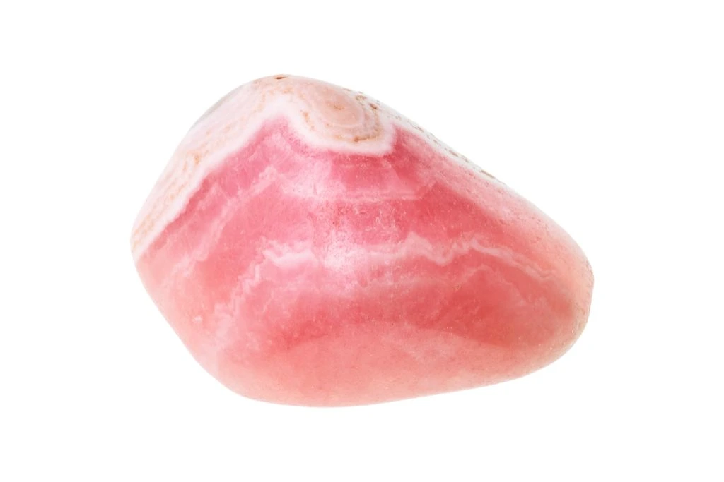 polished Rhodochrosite on a white background