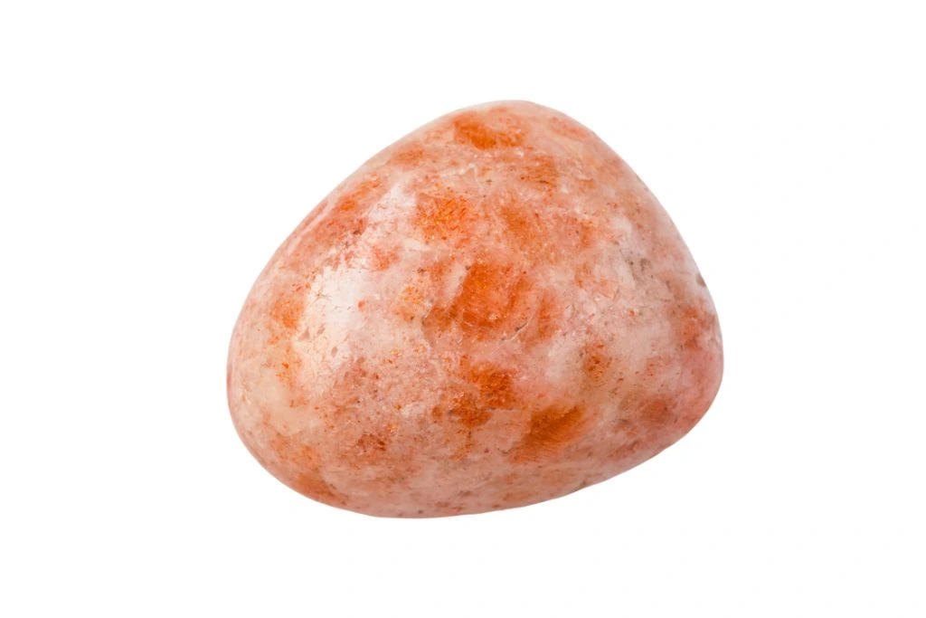 polished sunstone on a white background