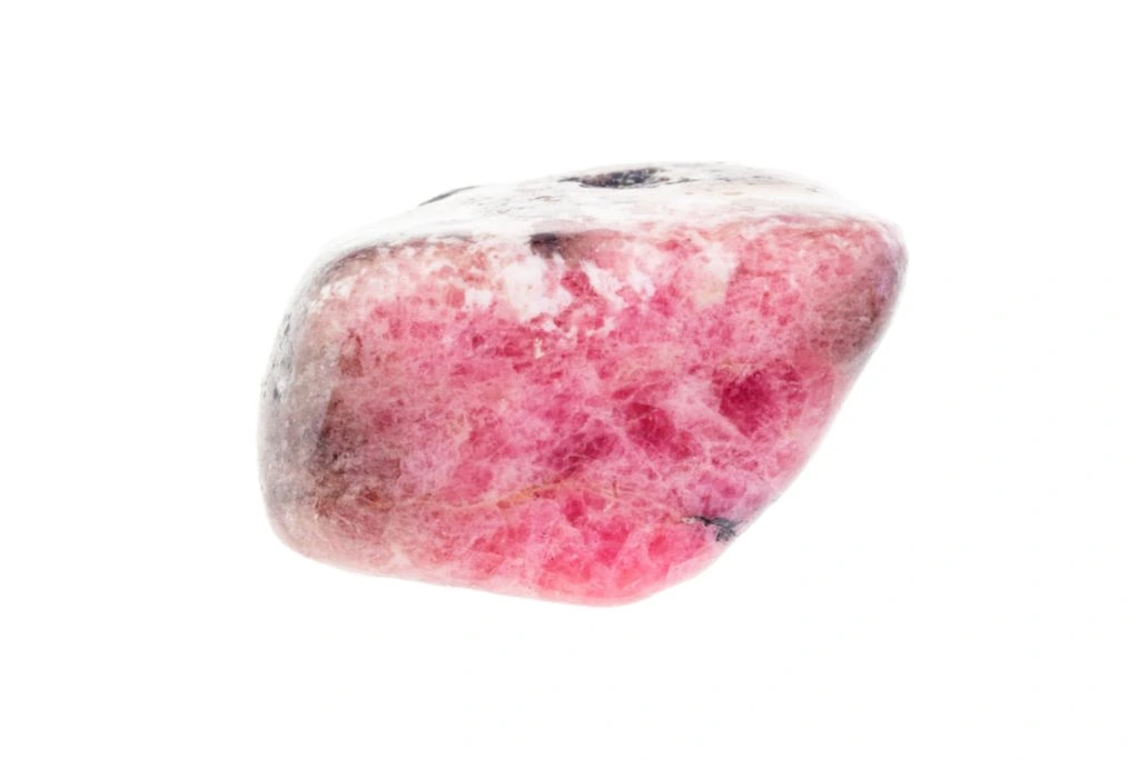 polished rhodonite on white background