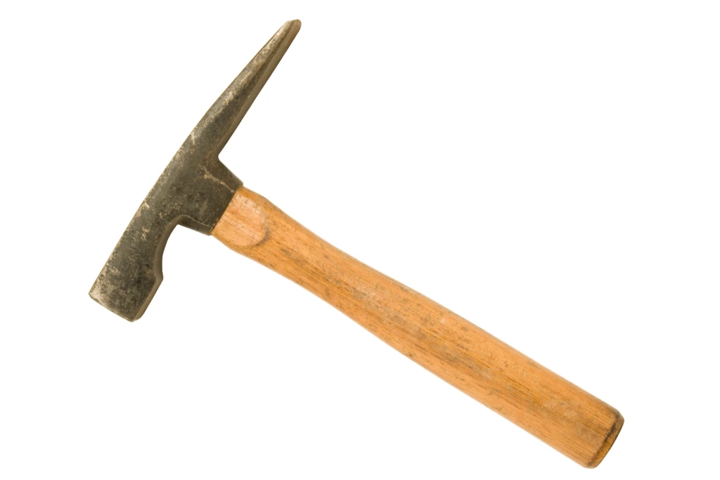 rock pick hammer on a white background