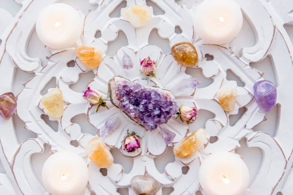 Well arrange candles, herb and crystals